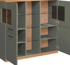 OTTO home Highboard »Ribe,120cm breit,112cm hoch,Oberplatte massiv,12 Fächer« Eiche massiv,Melamin Salbeigrün,schwarze Metall Griffe,Türen mit Glass