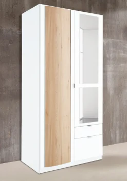 priess Kleiderschrank mit gerundeten Elementen auf den Außentüren