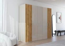 rauch Kleiderschrank »Drehtürenschrank Schrank Garderobe Wäscheschrank KONA« Breiten 251/301 cm, Höhe 223 cm, Tiefe 61 cm,Glasauflage, Massivholz-Absetzung, SOFT-CLOSE-FUNKTION MADE IN GERMANY