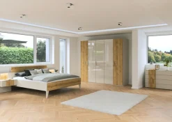 rauch Kleiderschrank »Drehtürenschrank Schrank Garderobe Wäscheschrank KONA« Breiten 251/301 cm, Höhe 223 cm, Tiefe 61 cm,Glasauflage, Massivholz-Absetzung, SOFT-CLOSE-FUNKTION MADE IN GERMANY